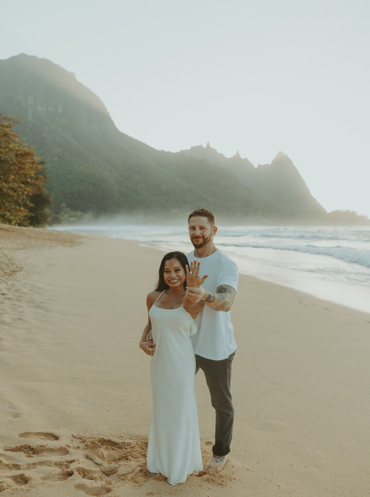 Man proposing to his girlfriend on the beach in Kauai
