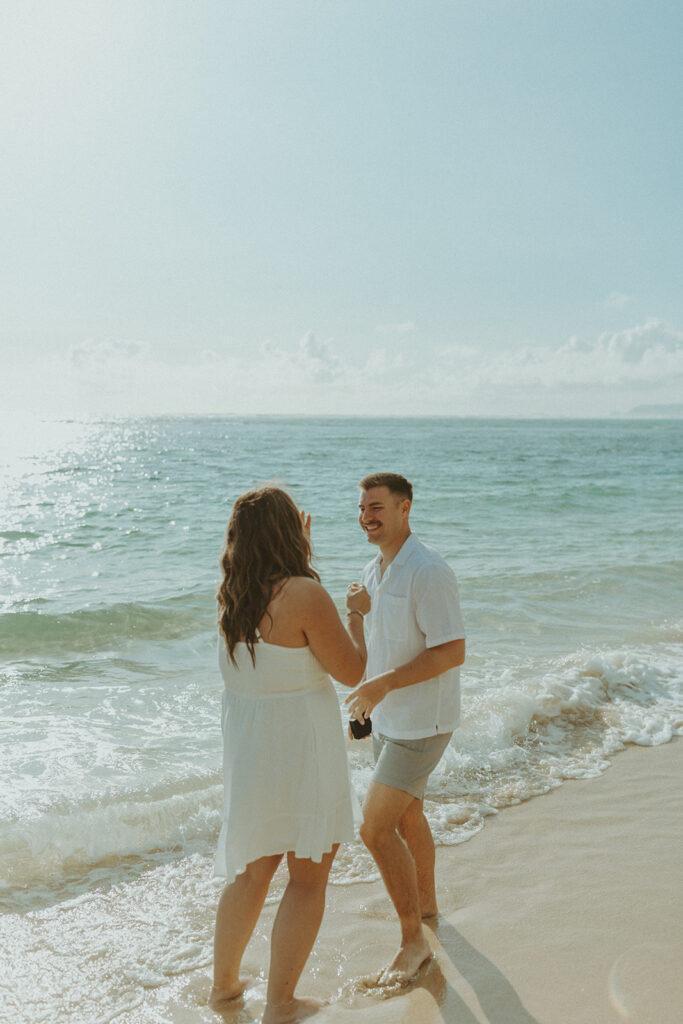 Emotional reaction as Nicole says yes during the surprise proposal photoshoot.
