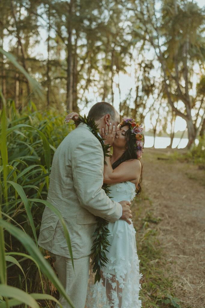 Newlyweds exploring a lush jungle location near Turtle Bay Resort after their ceremony.
