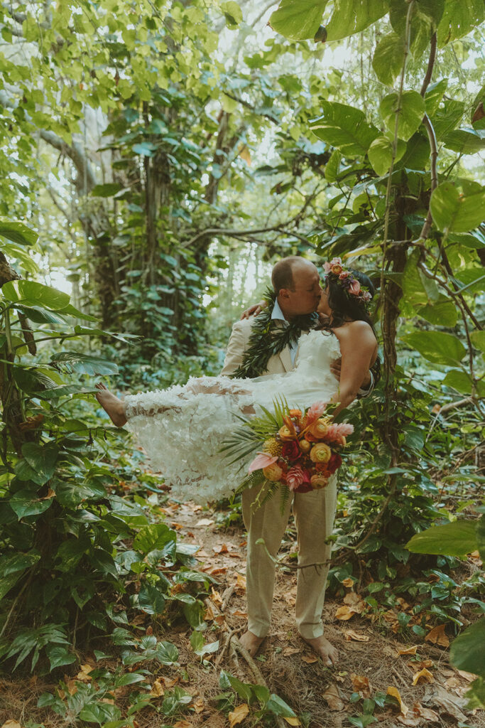 Newlyweds exploring a lush jungle location near Turtle Bay Resort after their ceremony.
North Shore Elopement in Oahu