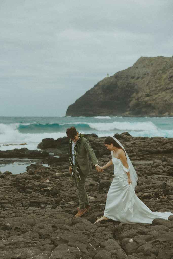 Wedding portraits taken in the mountains at Kualoa Ranch Jurassic Valley
