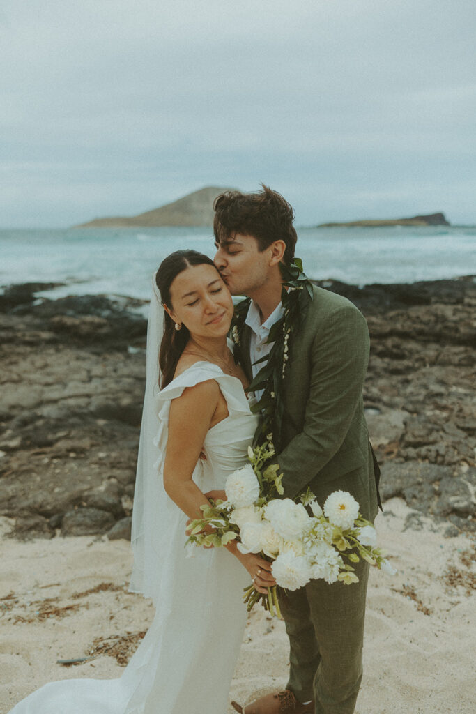 Wedding portraits taken in the mountains at Kualoa Ranch Jurassic Valley
