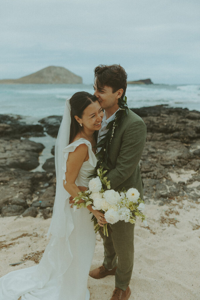 Wedding portraits taken in the mountains at Kualoa Ranch Jurassic Valley
