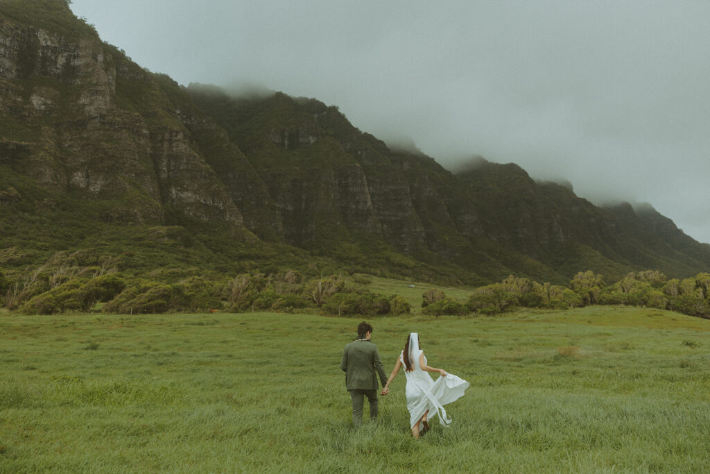Wedding portraits taken in the mountains at Kualoa Ranch Jurassic Valley
