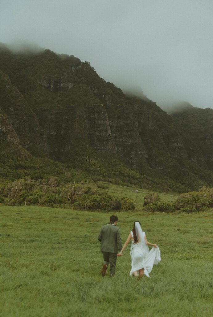 Wedding portraits taken in the mountains at Kualoa Ranch Jurassic Valley
