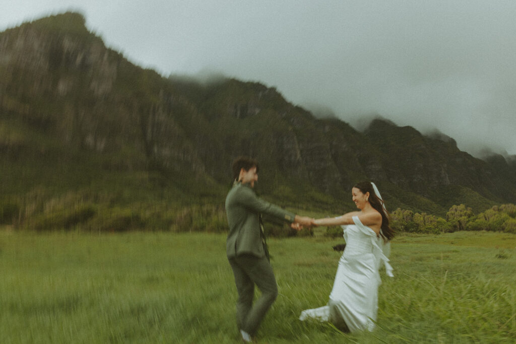 Wedding portraits taken in the mountains at Kualoa Ranch Jurassic Valley
