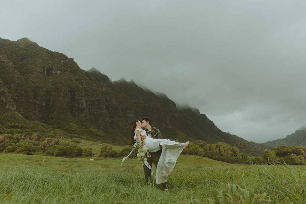 Couple standing together during their Makapuu Beach ceremony