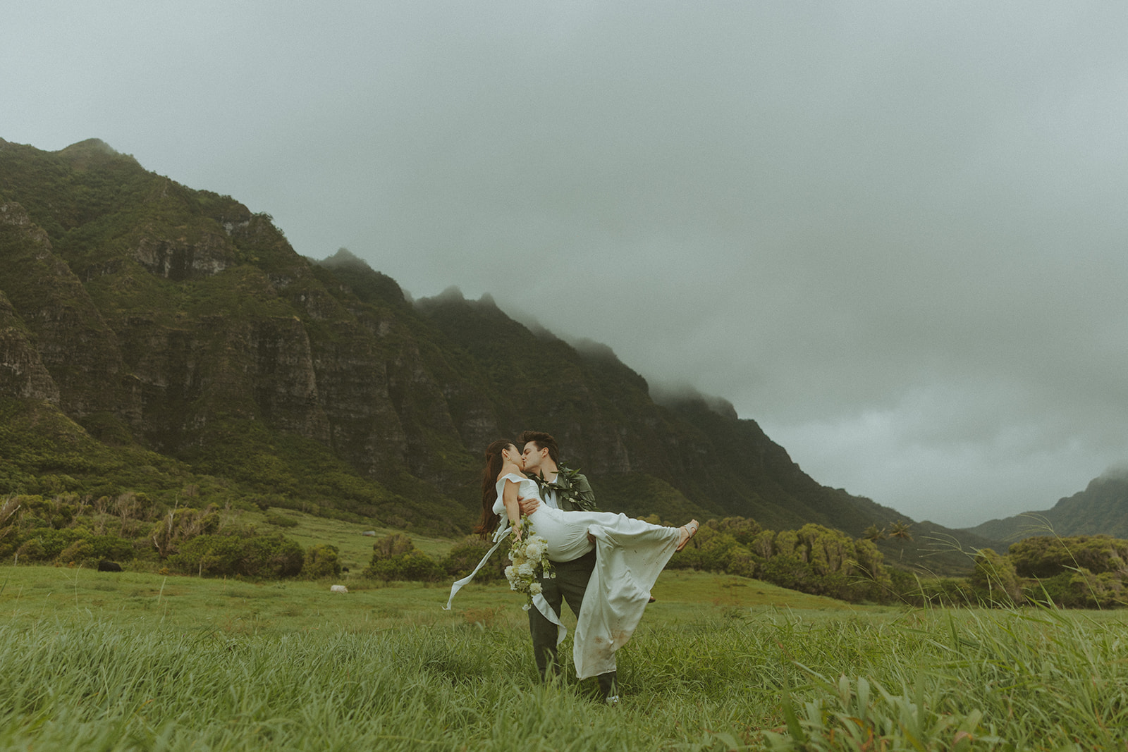 Couple standing together during their Makapuu Beach ceremony