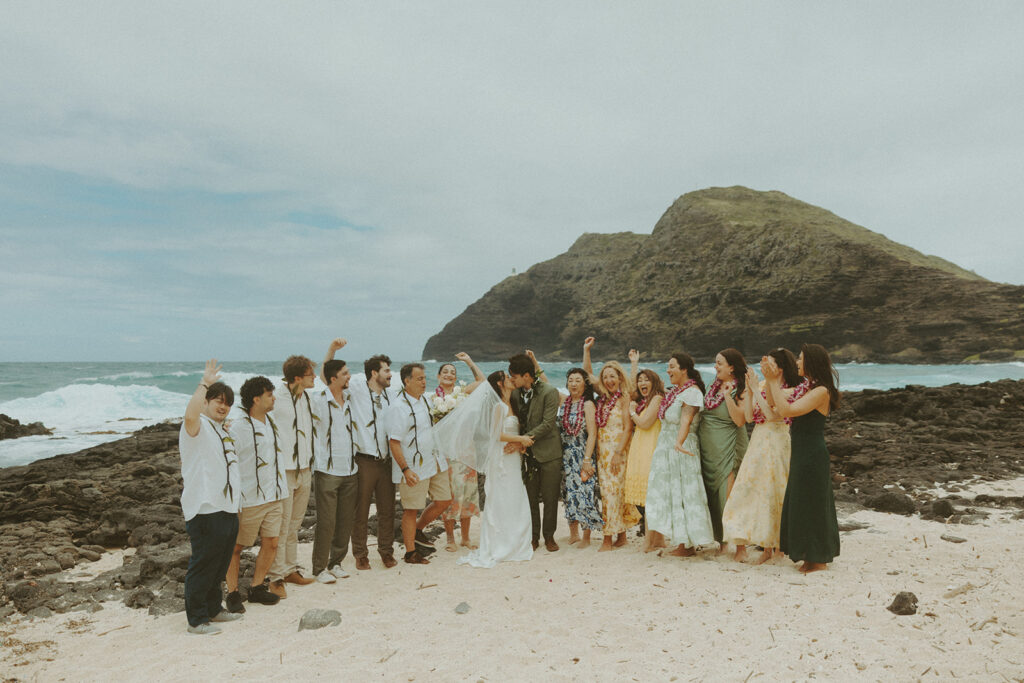 Couple standing together during their Makapuu Beach ceremony