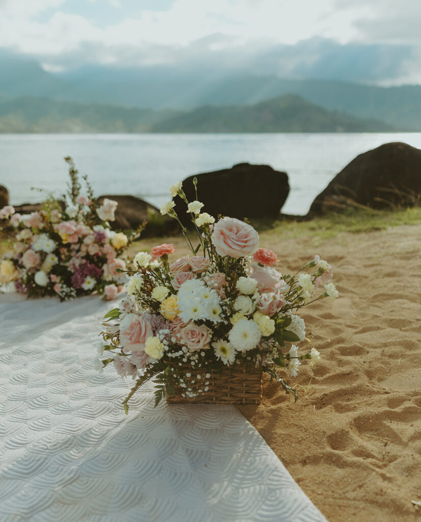 Newly engaged couple celebrating their proposal at 1 Hotel Hanalei Bay surrounded by tropical scenery