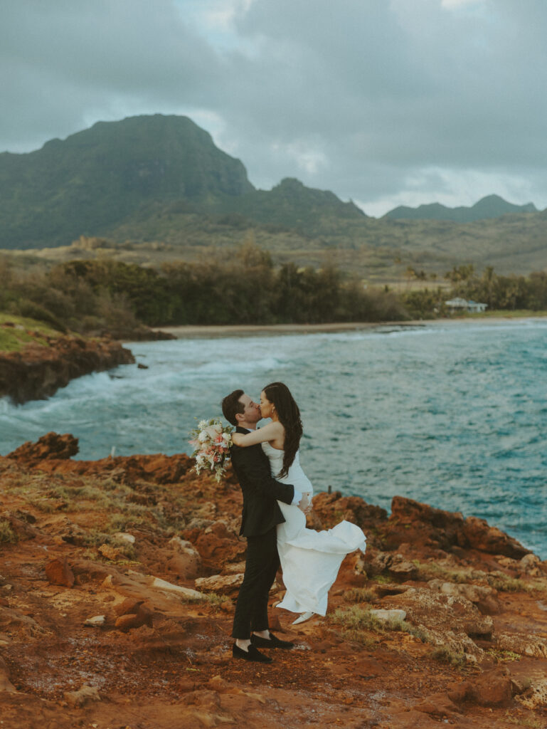 Romantic wedding portraits of a couple on the cliffs 
