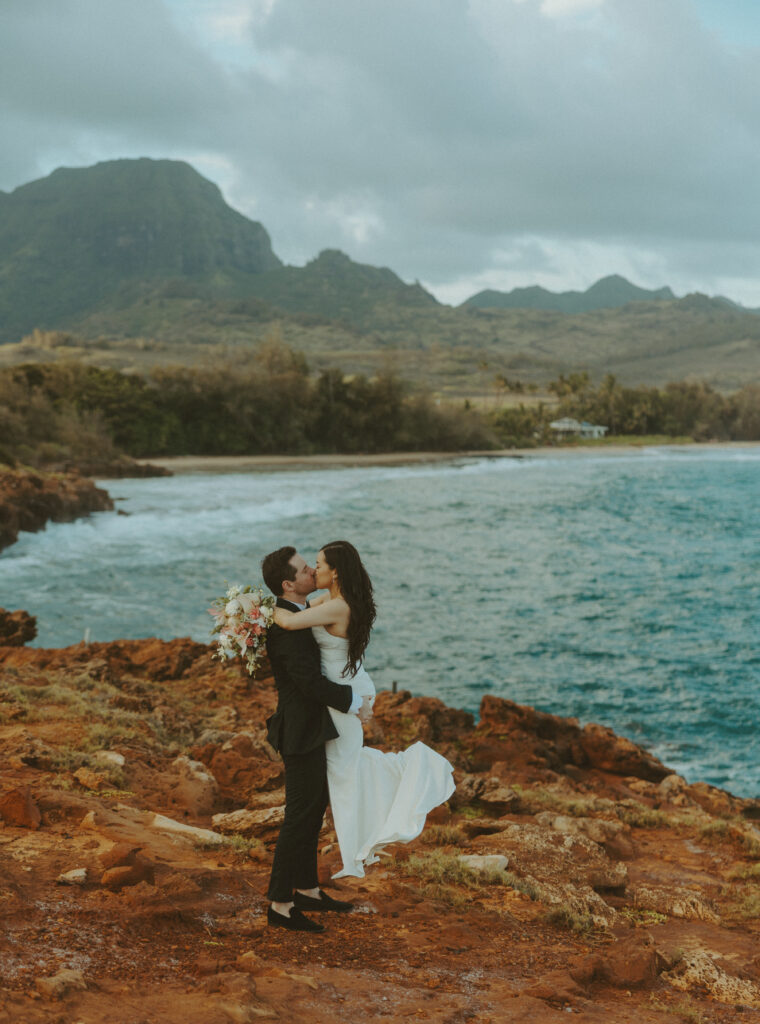 Romantic wedding portraits of a couple on the cliffs 

