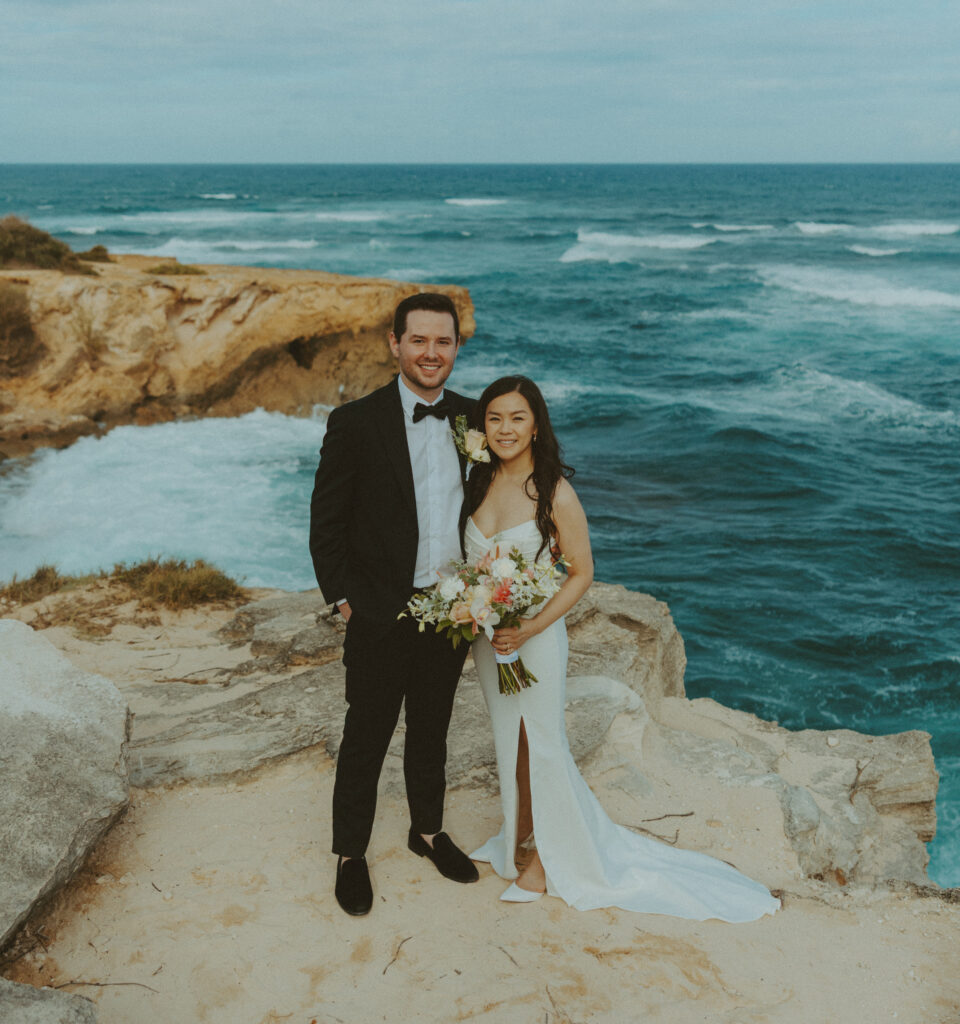Romantic wedding portraits of a couple on the cliffs 
