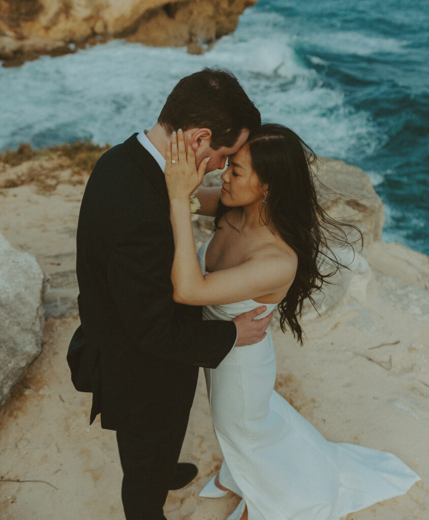 Romantic wedding portraits of a couple on the cliffs 
