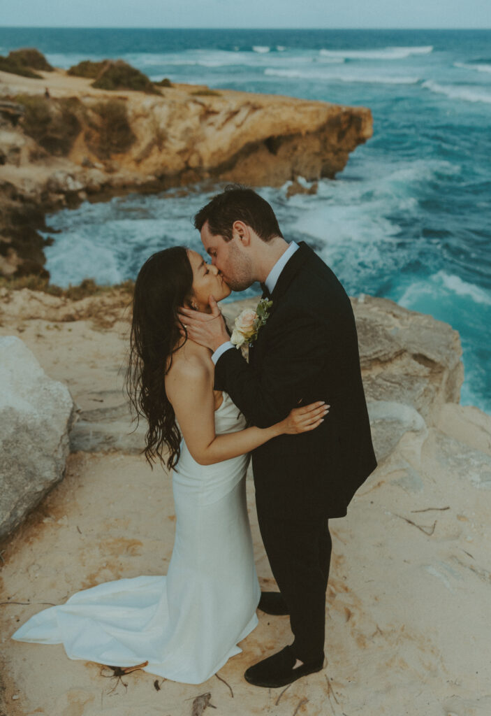 Romantic wedding portraits of a couple on the cliffs 
