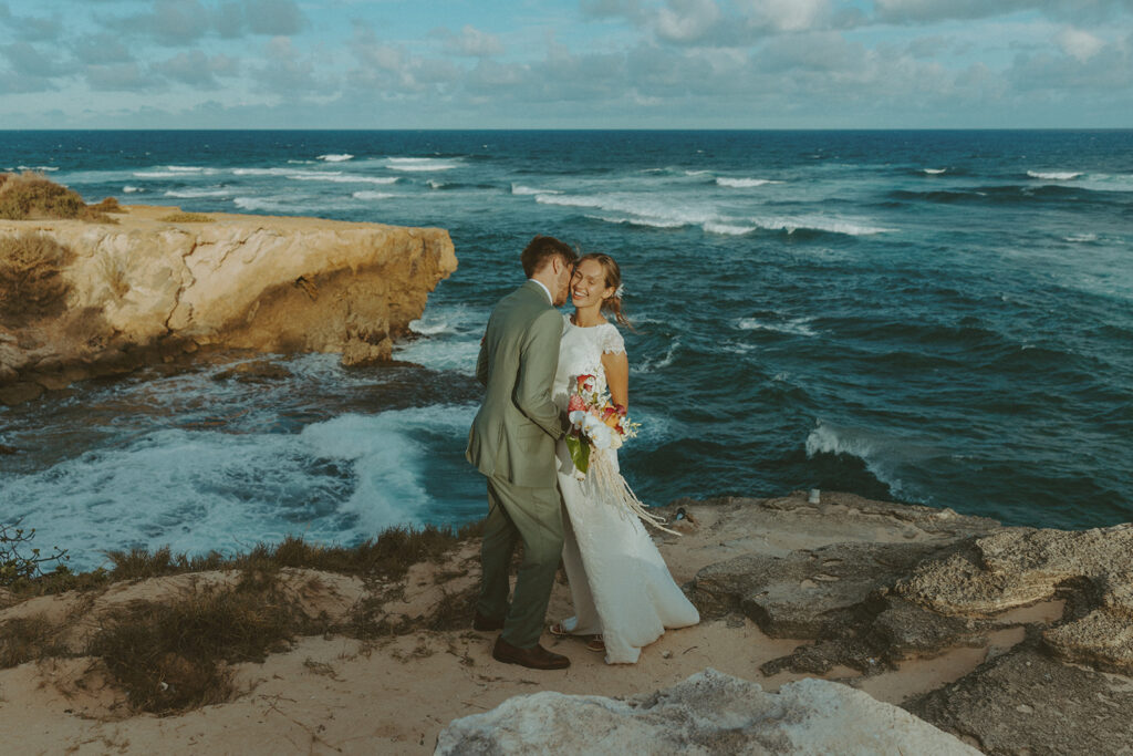 Romantic Kauai wedding photos captured by a Hawaii wedding photographer along the cliffs
