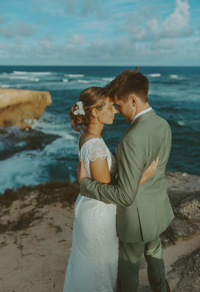 Romantic Kauai wedding photos captured by a Hawaii wedding photographer along the cliffs