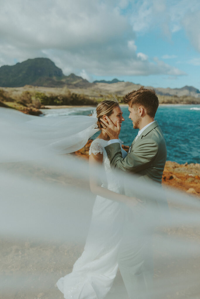 Sunrise couple portraits on the north shore of Kauai during a full weekend wedding experience
