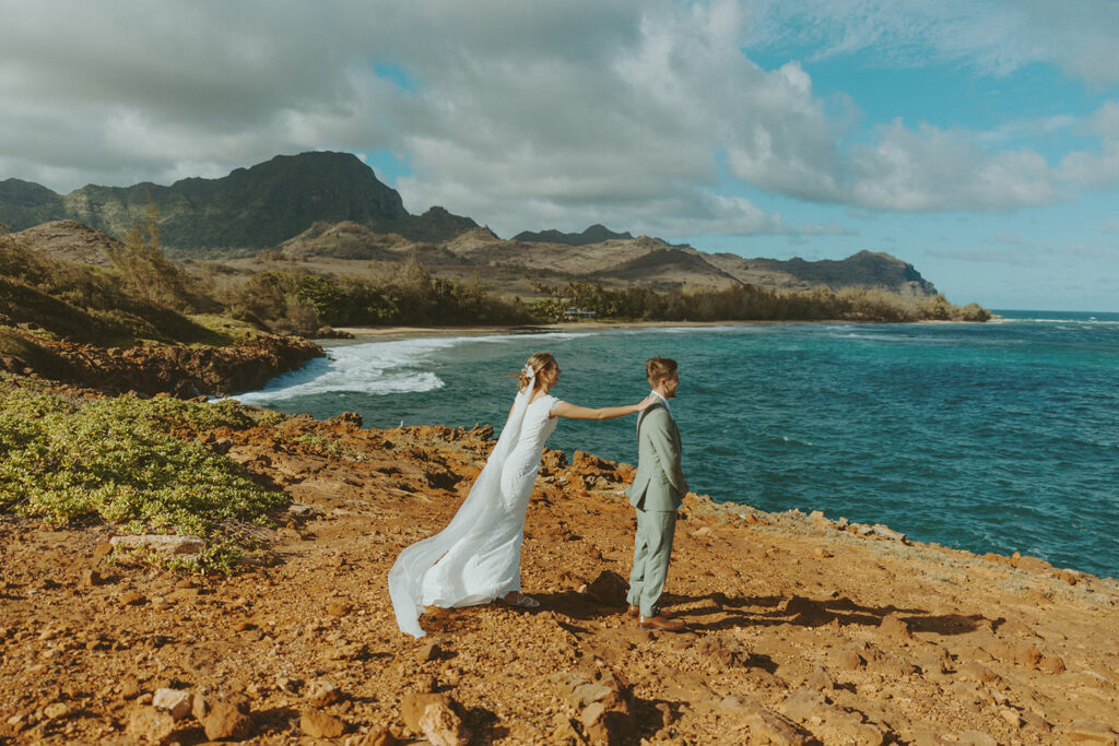 Sunrise couple portraits on the north shore of Kauai during a full weekend wedding experience
