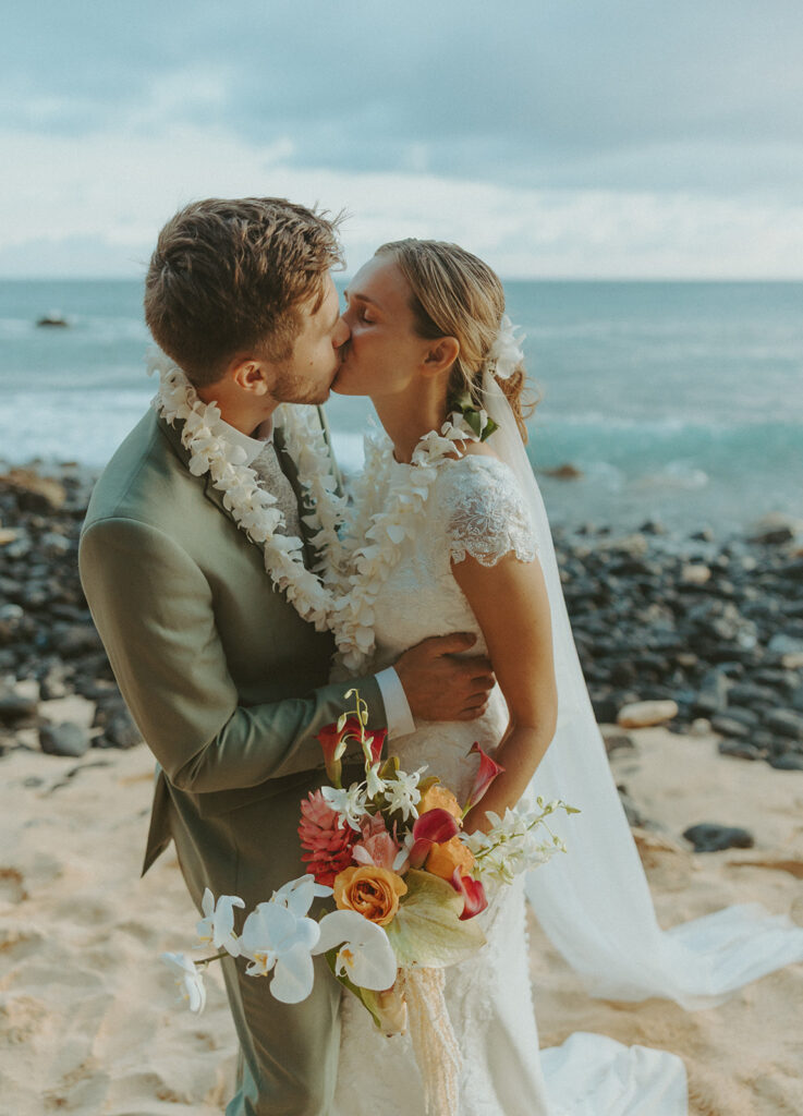 Romantic Kauai wedding photos captured by a Hawaii wedding photographer along the cliffs
