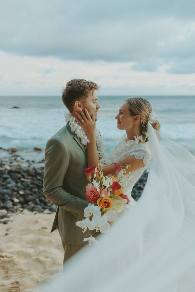 Romantic Kauai wedding photos captured by a Hawaii wedding photographer along the cliffs
