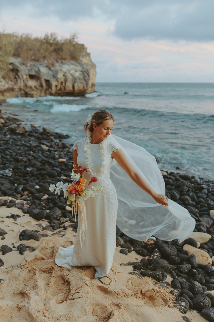 Sunrise couple portraits on the north shore of Kauai during a full weekend wedding experience
