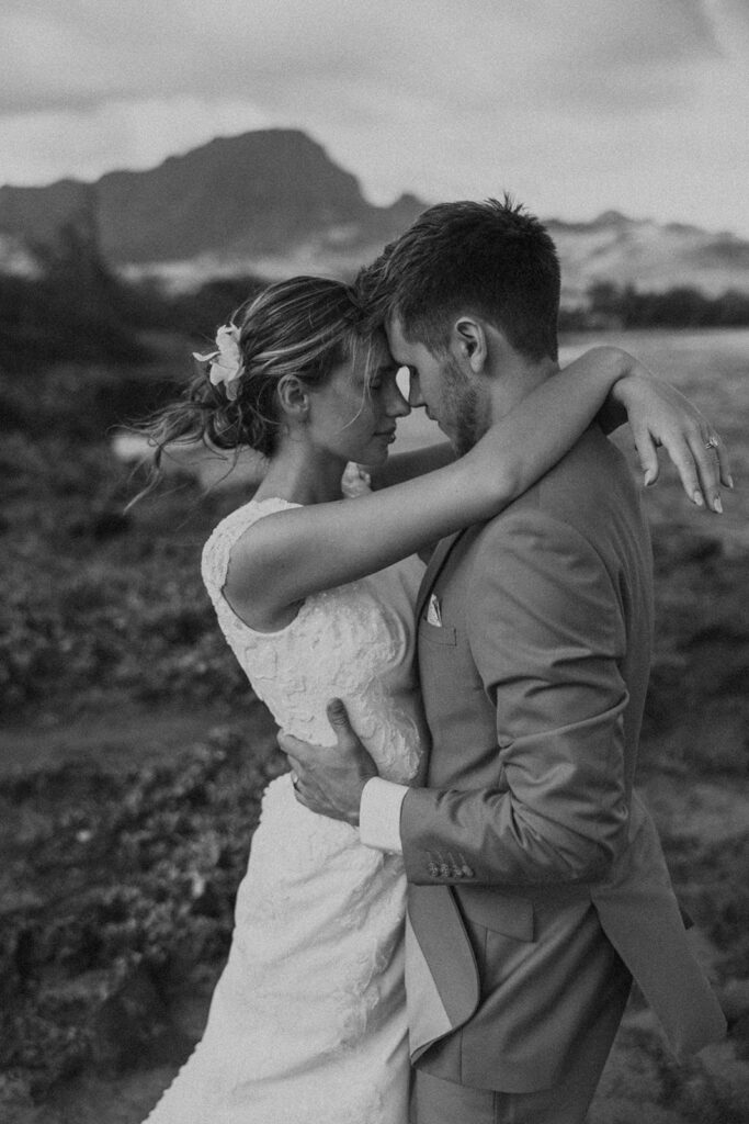 Sunrise couple portraits on the north shore of Kauai during a full weekend wedding experience

