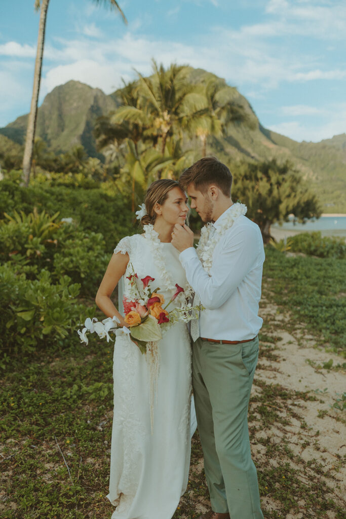 Sunrise couple portraits on the north shore of Kauai during a full weekend wedding experience
