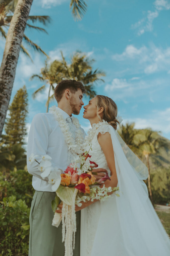 Sunrise couple portraits on the north shore of Kauai during a full weekend wedding experience