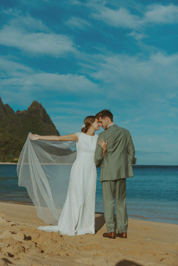 Sunrise couple portraits on the north shore of Kauai during a full weekend wedding experience
