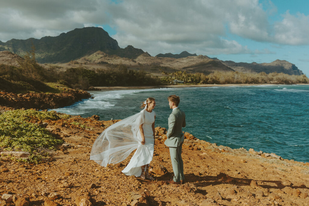 Sunrise couple portraits on the north shore of Kauai during a full weekend wedding experience
