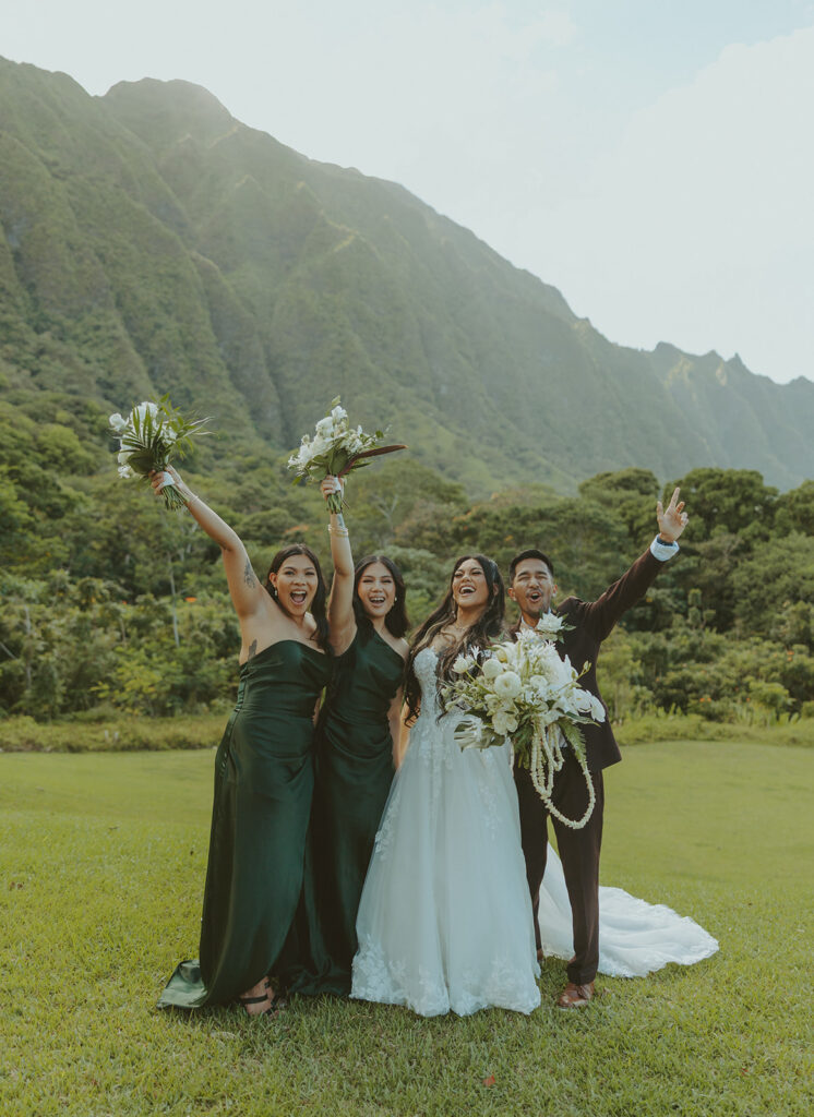 Elegant outdoor wedding ceremony setup with mountain views and floral arch

