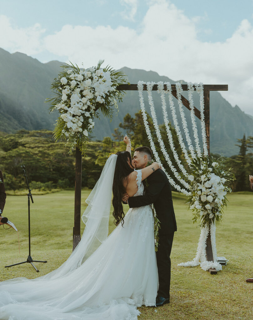 Romantic wedding couple portrait in a scenic natural landscape
