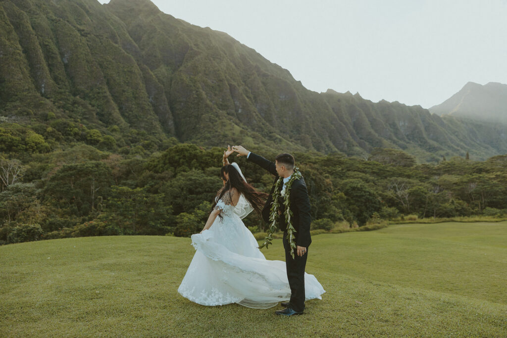 Romantic wedding couple portrait in a scenic mountain landscape