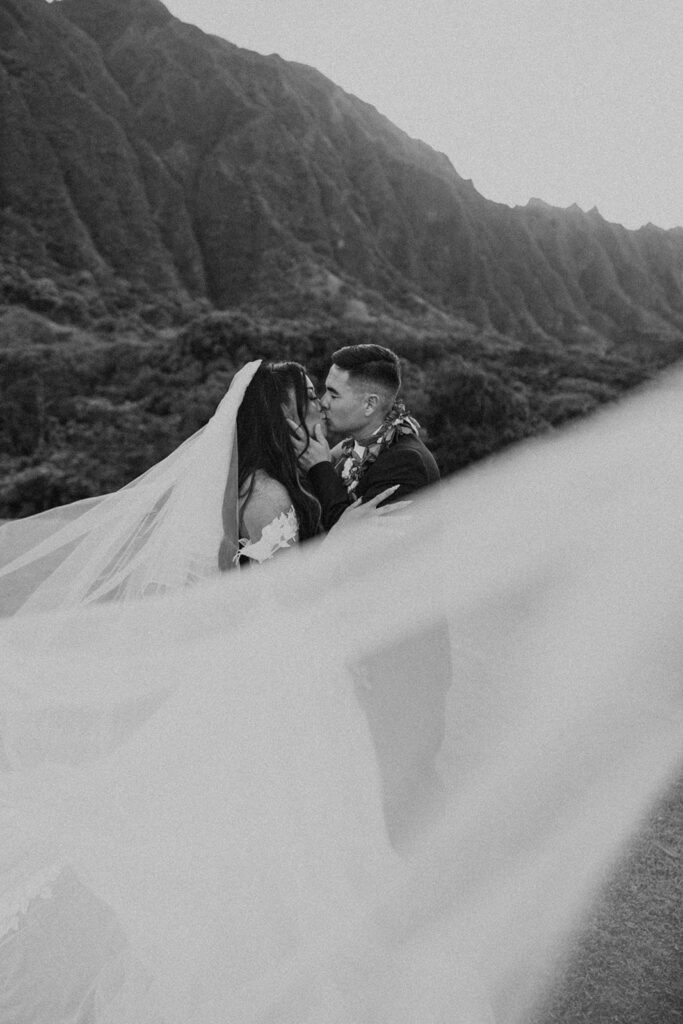 Bride and groom sharing a quiet moment outdoors after their ceremony