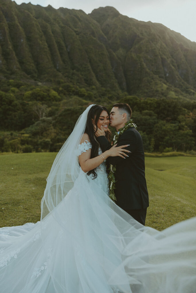 Romantic wedding couple portrait in a scenic natural landscape