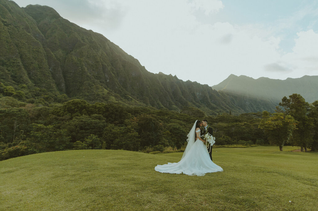 Bride and groom sharing a quiet moment outdoors after their ceremony