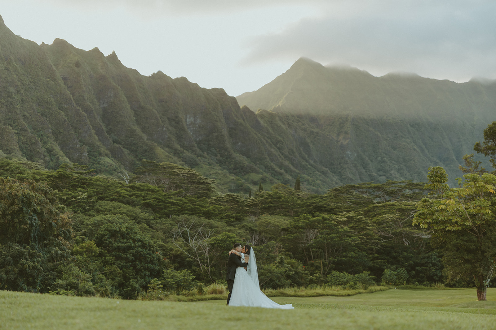 Romantic wedding couple portrait in a scenic natural landscape