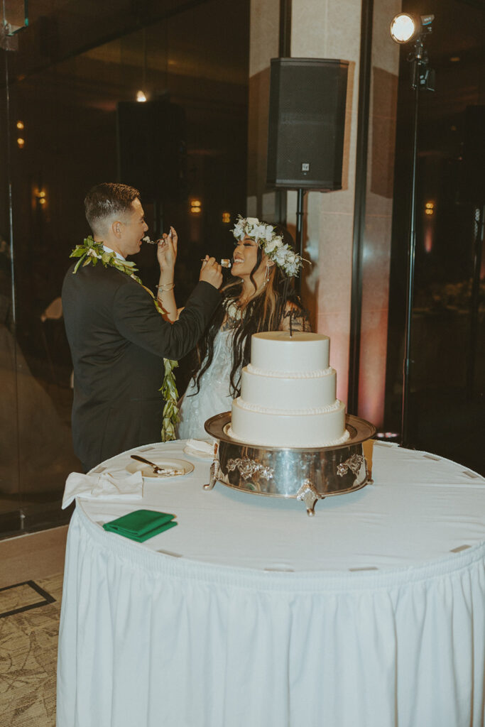 Bride and groom enjoying their reception with family and friends