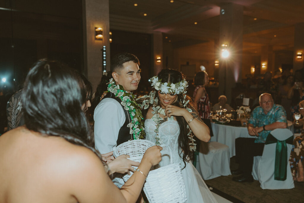Bride and groom enjoying their reception with family and friends